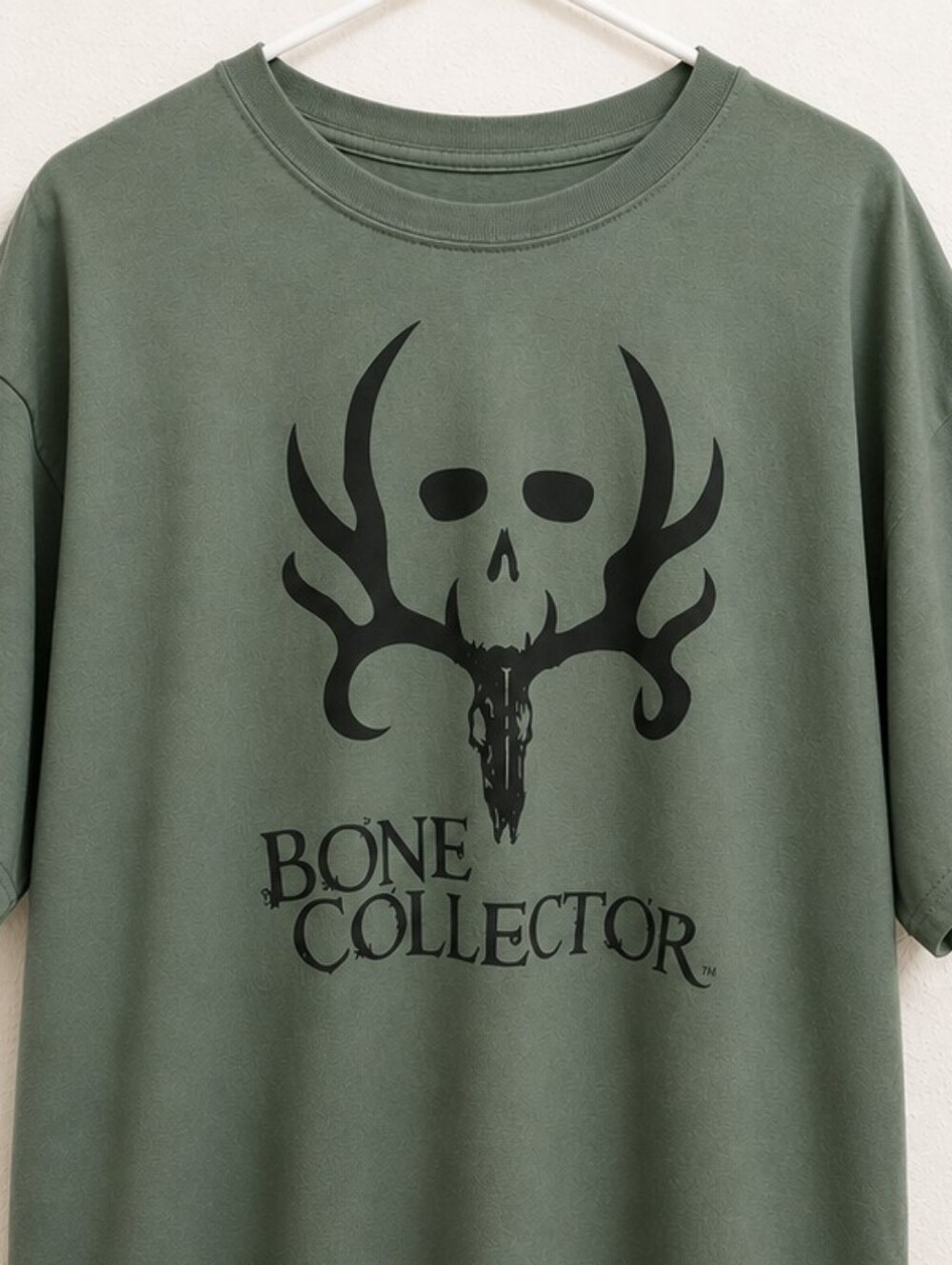 Bone Collector Graphic Tee — Olive Green with Black Print